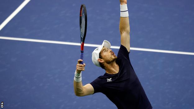 Andy Murray serves during his US Open second round defeat by Felix Auger-Aliassime