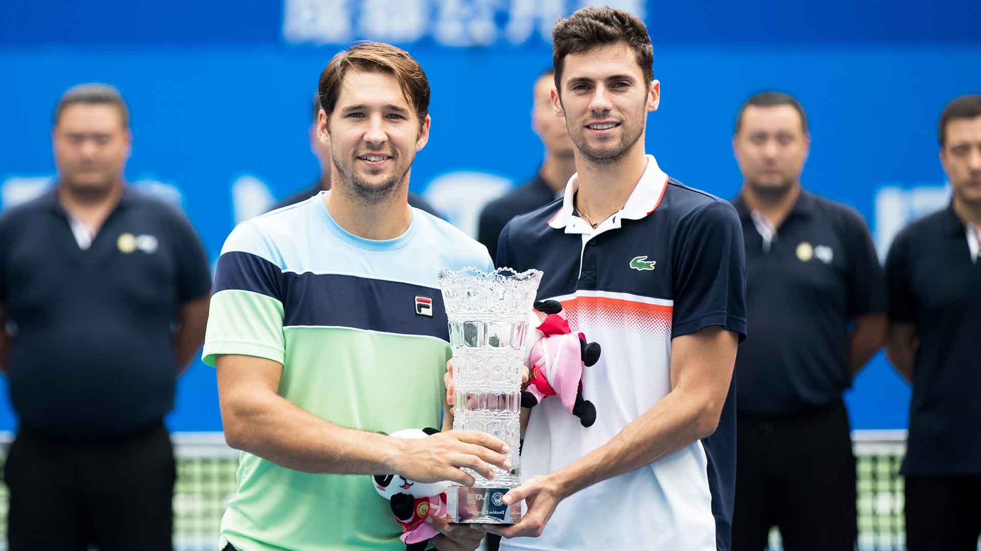 <a href='/en/players/dusan-lajovic/l987/overview'>Dusan Lajovic</a> and <a href='/en/players/nikola-cacic/cc54/overview'>Nikola Cacic</a> lift their first tour-level trophy as a team.