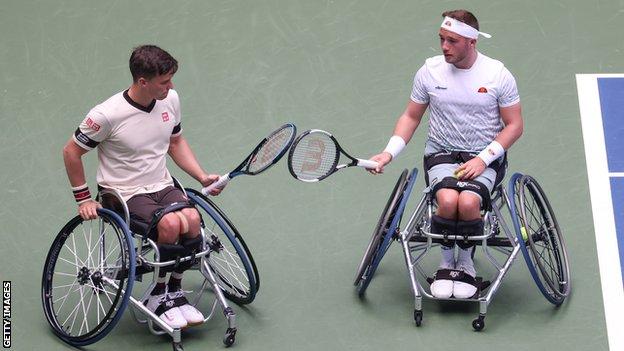 Gordon Reid and Alfie Hewett tap racquets