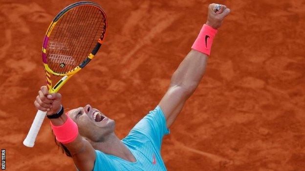 Rafael Nadal celebrates beating Diego Schwartzman in the French Open