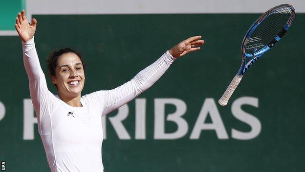 Martina Trevisan celebrates beating Kiki Bertens