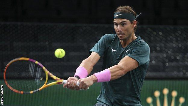 Rafael Nadal hits the ball