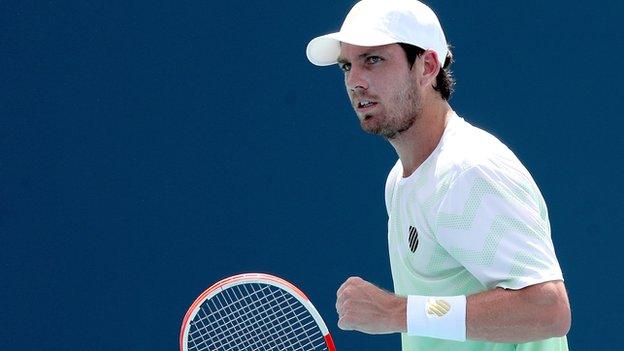 Cameron Norrie celebrates winning a point against Grigor Dimitrov in the Miami Open