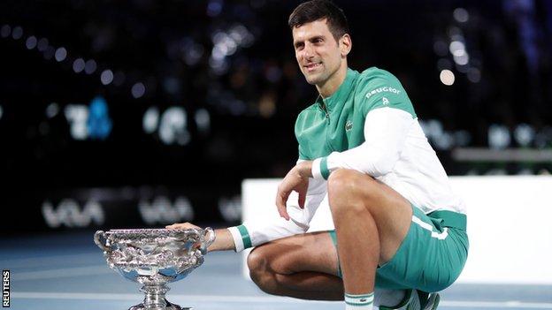 Novak Djokovic celebrates his Australian Open win