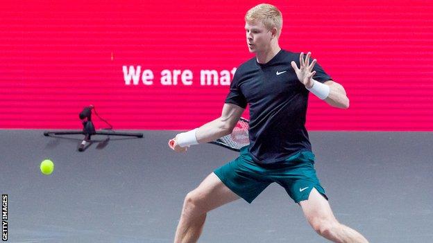 Kyle Edmund plays a forehand shot during a match