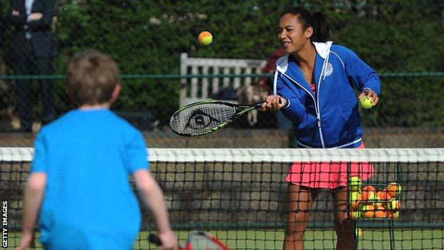 Heather Watson coaches a young child